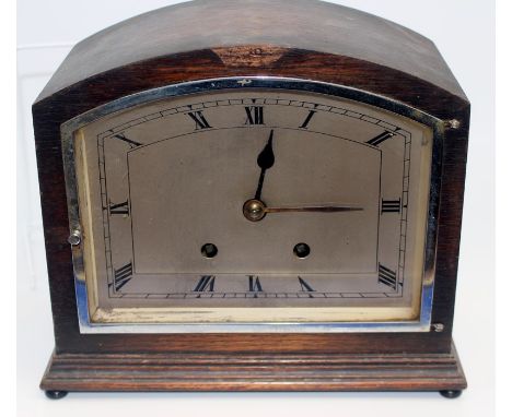 A late 19th Century mahogany cased German mantle clock, painted dial with Roman numerals, brass markings, together with an Ar