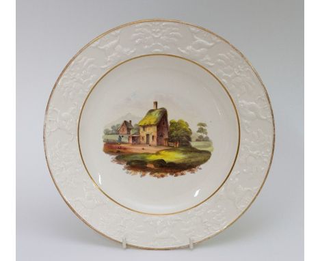 An early nineteenth century moulded and hand-painted Wilson creamware plate, circa 1815-25. It is impressed WILSON to the und