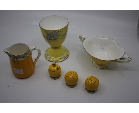 &nbsp;A group of Royal Worcester, all yellow ground including: set of three condiments (salts &amp; a pepper pot) puce marks;