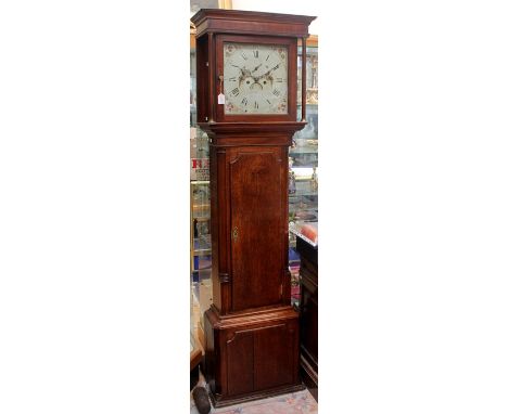 An early 19th Century oak and mahogany eight day longcase clock, circa 1830, the hood with a moulded cornice, the single door