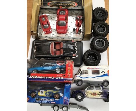 Ferrari set of three, by Burago. Large scale Chevrolet Corvette, two radio controlled cars, Subaru and Pontiac, etc.