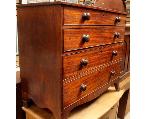 A George III mahogany chest of drawers, circa 1790, comprising four long graduated drawers, cock-beaded edges, later wooden h