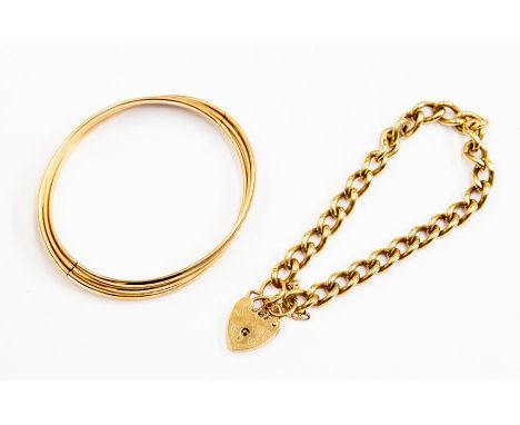 A 9ct yellow gold curb link padlock bracelet, length approx. 8'', total gross weight approx. 24.4gms link stamped 375, hallma
