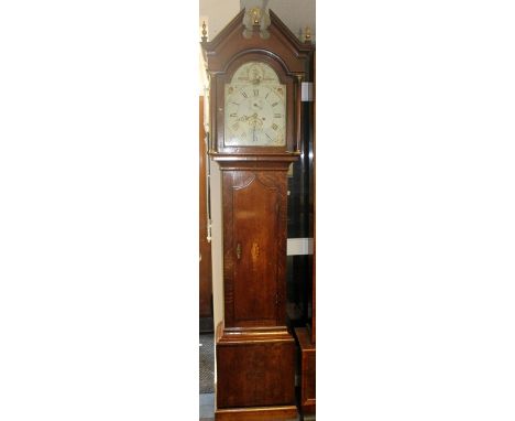 A George III oak and mahogany eight day longcase clock, inscribed 'Dent, Lincoln', the hood with a broken pediment and brass 