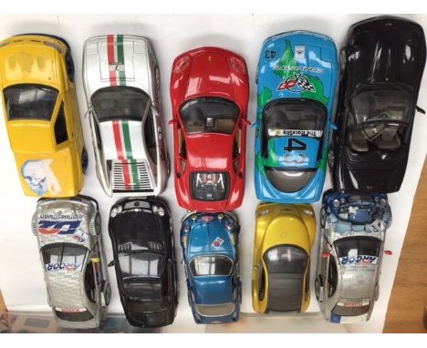 Die cast collection of 1:18 scale cars, unboxed.