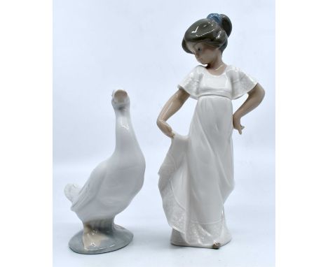 A pair of Nao figures including a young girl and a goose. Height of girl approx 21.5cm , height of goose approx 15cmCondition