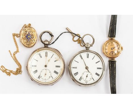 A Victorian yellow metal oval locket with blue enamel star detail, a 9ct gold cased watch and two silver cased pocket watches
