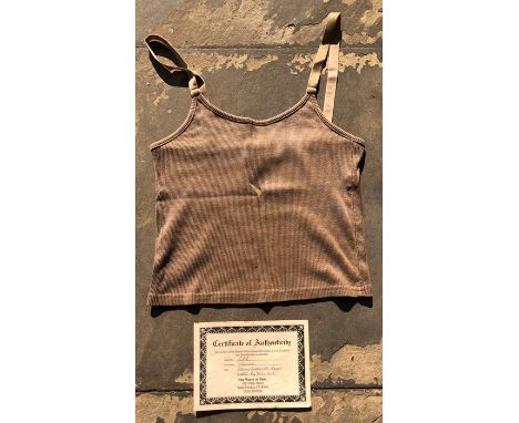 Cher - Muscian and actress, a cotton 1980s Top in a Mushroom colour with velvet straps that belonged to the artist and actres
