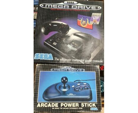 Sega Megadrive, boxed with large quantity of games, along with Mega DDrive II, and boxed arcade power stick (2 boxes)