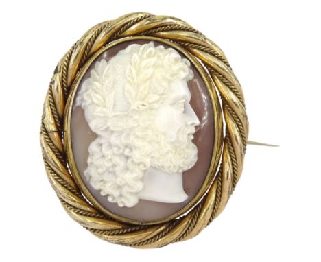 Victorian gilt shell cameo swivel brooch, carved depicting Jupiter in profile, wearing a garland of laurel leaves, in a rope 