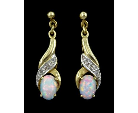 Pair of 9ct gold opal and diamond pendant stud earringsCondition Report:Approx 1.5gm, tested 9ct, length = 22mm, good conditi