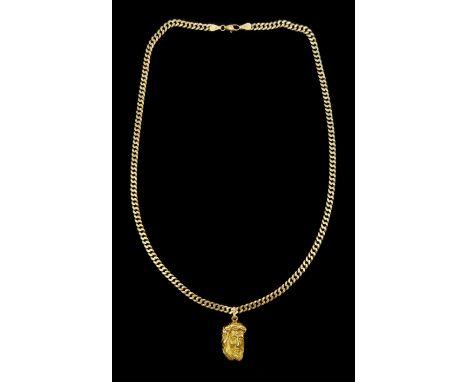 Gold Jesus portrait pendant, on a 9ct gold flattened curb link chain necklace, import Birmingham 1970Condition Report:9ct gol