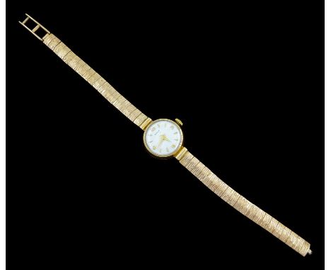 Enicar ladies 9ct gold manual wind wristwatch, Birmingham 1960, on integral 9ct gold braceletCondition Report:Approx 12.4gm e