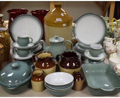 A Denby Pottery Regency Green part dinner and tea service comprising dinner plates, salad plates, side plates, vegetable dish