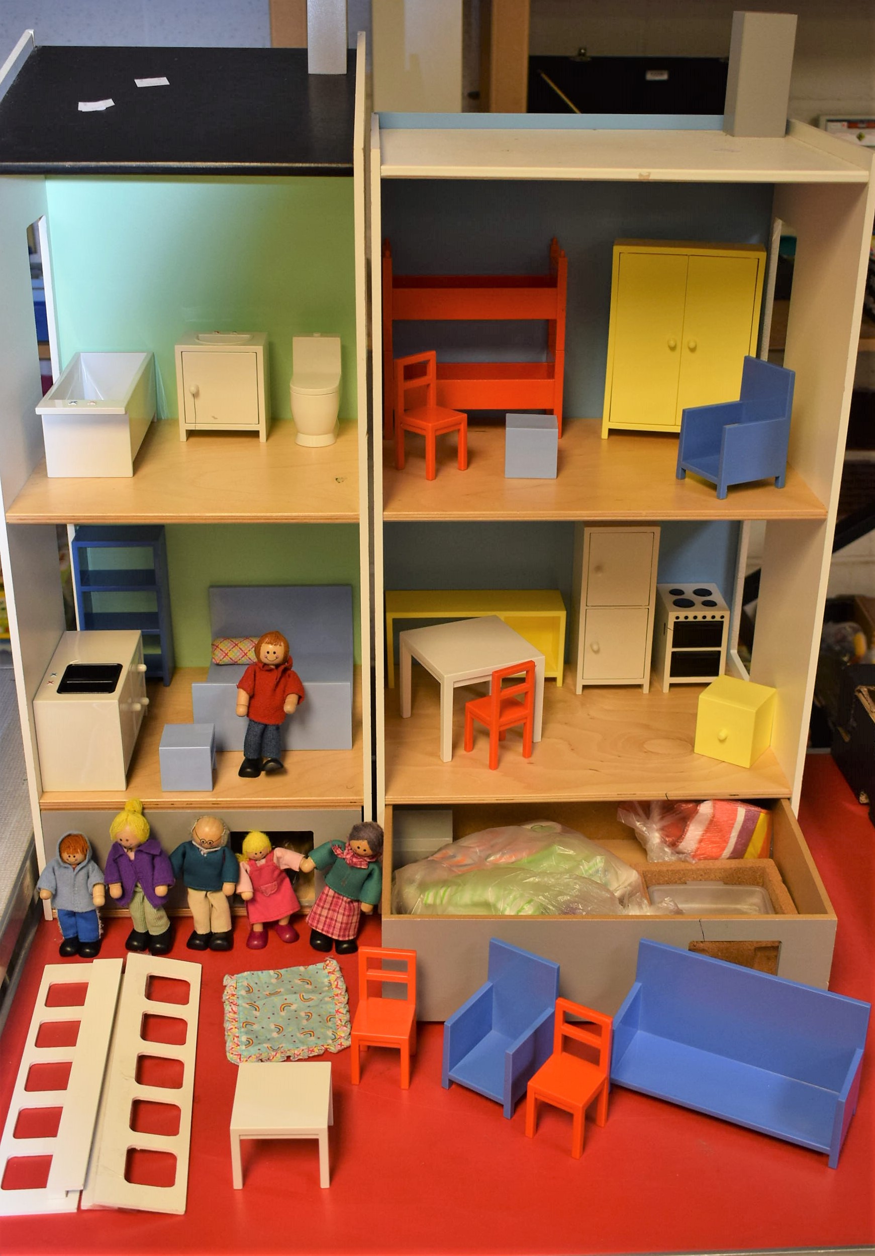An Ikea two section dolls house with An Ikea two section dolls house with
