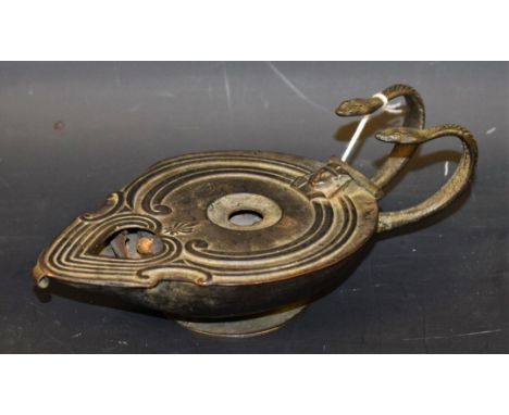 A 19th century verdigris patinated novelty rotating candle oil lamp or lighter, after the antique, marked B&AB Patent, snake 