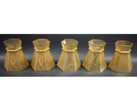 A set of five frosted glass hexagonal lamp shades, applied in gilt, 15cm high approx.