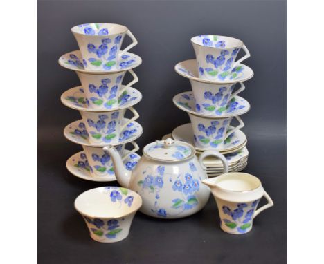 A Colclough part tea service, decorated with flowers, comprising cups, saucers, plates, milk jug, sugar bowl and teapot