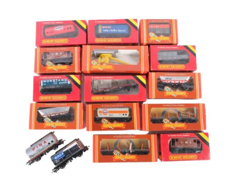 A quantity of Hornby Railways OO gauge goods wagons and other carriers, both boxed and unboxed, 16 in total, including R.137 