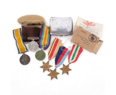 A group of military medals, including 2 First World War named to Capt. A. Logan (no other inscription to the edge of the meda