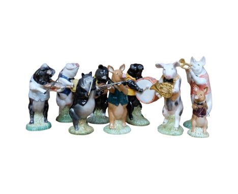 A group of 9 Beswick pig figure musicians, including Matthew The Bugle Player, H15cm 