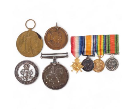 A group of miniature First and Second World War medals, a First World War medal and Defence medal named to G.50530 Pte. R. G.