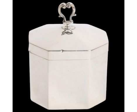A George V silver tea caddy with hinged lid of canted form, H9.5cm, 3.5oz 