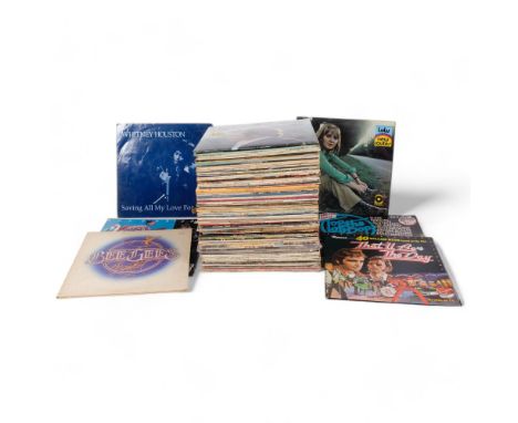 A quantity of vinyl LPs and 12" singles, various artists and genres, including David Bowie, Cliff Richard, Michael Jackson, C