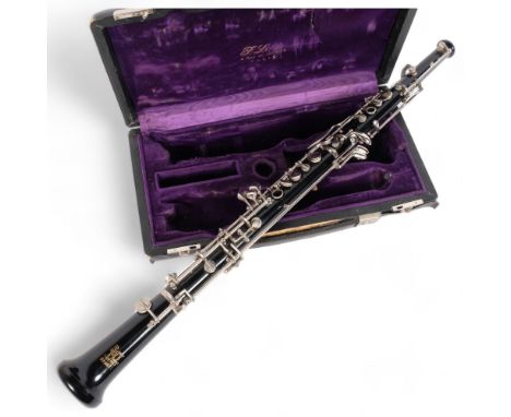 A Boosey & Hawkes oboe, serial no. 496971, in associated fitted hardshell casing 