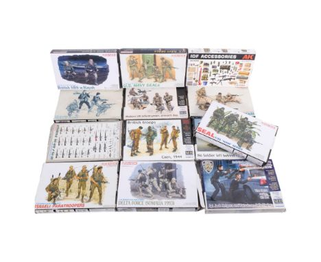 A quantity of plastic model display kits, mostly military related in nature, various brands and scales, including Dragon, Aki