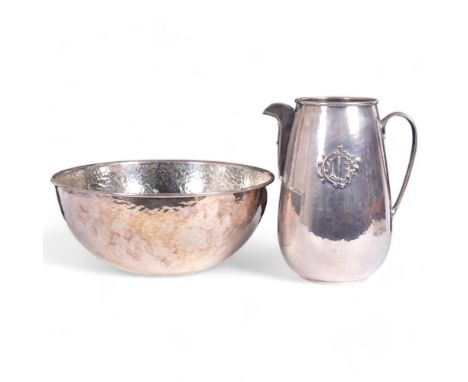 CHRISTIAN DIOR - a hammered silver plated water jug, with embossed monogram, H24cm, and a large fruit bowl, diameter 31cm, bo