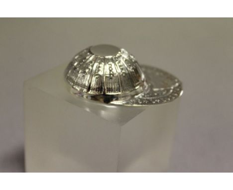 A sterling silver vesta case in the shape of a baseball cap