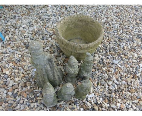 A composite set of Snow white and five dwarfs and a similar planter