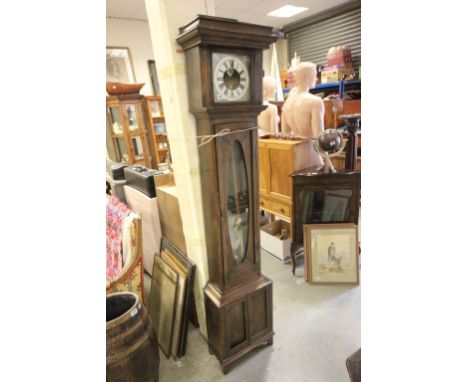 Oak Longcase Earth Clock, the square hood with an open white enamel face revealing the clock workings and seconds dial