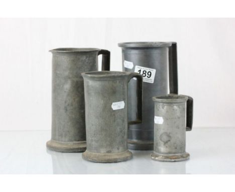 Four vintage French pewter grain measures in various sizes
