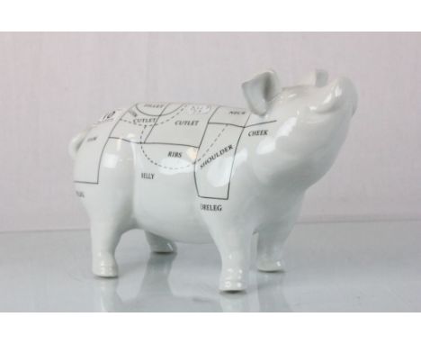 A ceramic pig butchers shop display