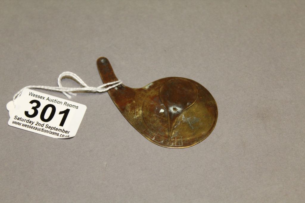 An antique brass spinner, possibly scientific