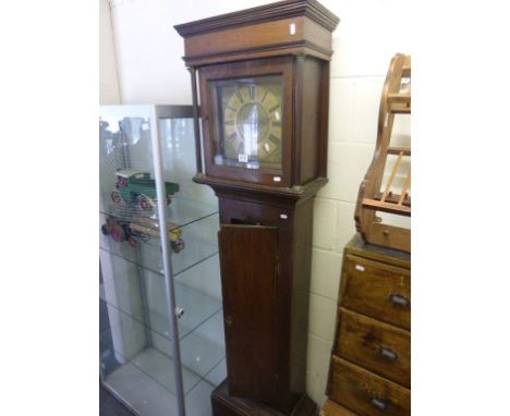 An antique oak cased longcase clock with 30 hour movement the brass face signed William Field  Bungay who established clock m