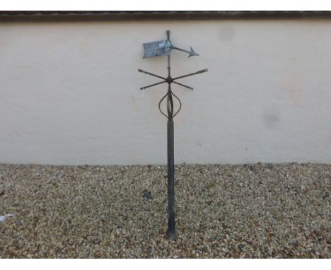 A vintage iron and lead weather vane.