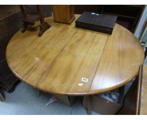 Ercol Pale Elm oval drop leaf table.