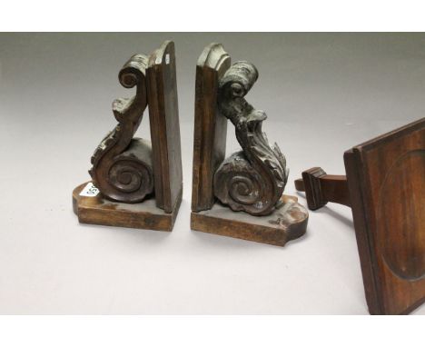 Carved pair of wooden shelf brackets and a mahogany pot stand