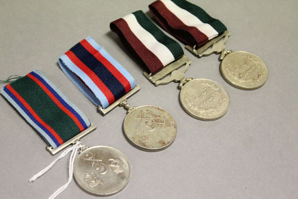 Four Pakistani Medals with Ribbons