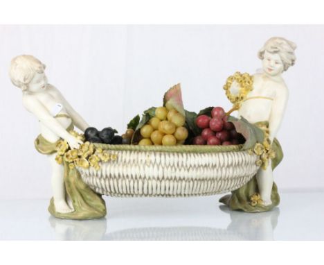 Amphora ceramic fruit bowl with cherubs, numbered to base L1029