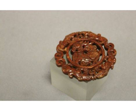 A carved jade oriental BI