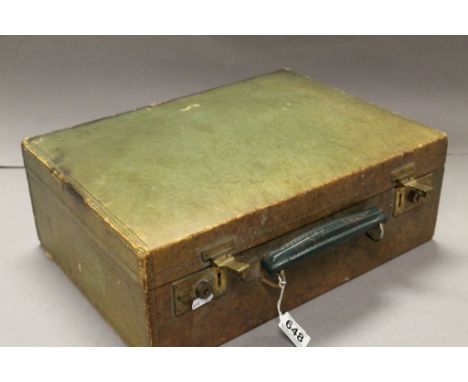 Vintage leather case with brass locks