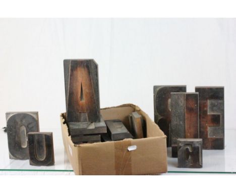 Box of vintage wooden print block letters