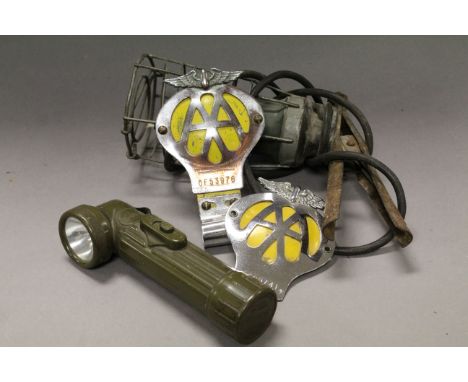 A vintage engineers inspection light army torch and two AA badges