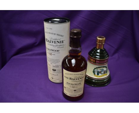 A bottle of Balvenie Double Wood 12 Year Old Scotch Whisky, 70cl, 40% vol in card tube along with a ceramic decanter of Bells