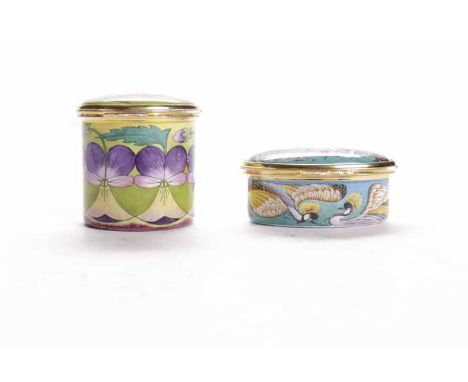 TWO MOORCROFT ENAMELLED MINIATURE TRINKET BOXES
one of oval form decorated with crested cranes, the other of tall round form,
