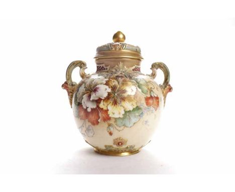 ROYAL WORCESTER BLUSH IVORY POT POURRI AND COVER
with pierced and moulded twin handles and decorated with stylised floral mot